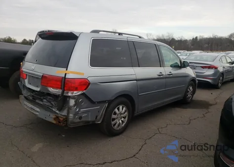 2010 Honda Odyssey Ex-L z USA, uszkodzony, nr VIN 5FNRL3H74AB098938